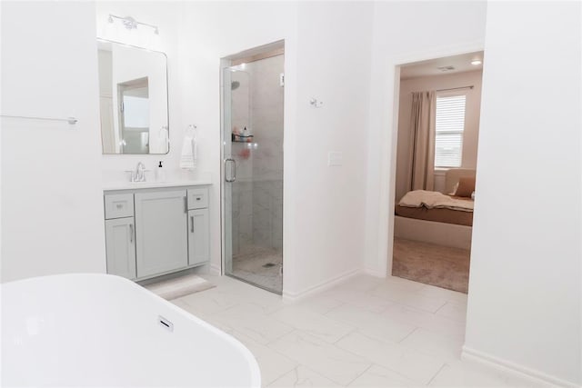 7310 S Brookwater Way, Stillwater, OK 74074 - full bathroom featuring a stall shower, a freestanding bath, baseboards, marble finish floor, and vanity