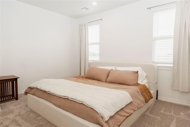 7310 S Brookwater Way, Stillwater, OK 74074 - bedroom with baseboards, carpet flooring, and recessed lighting