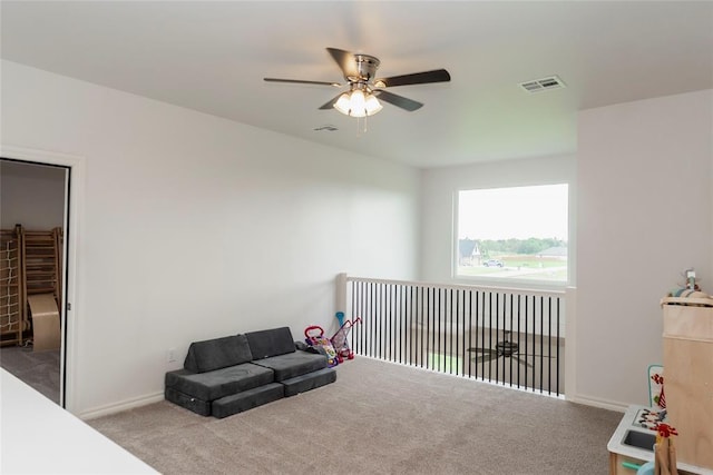 7310 S Brookwater Way, Stillwater, OK 74074 - carpeted bedroom with baseboards, visible vents, and a ceiling fan