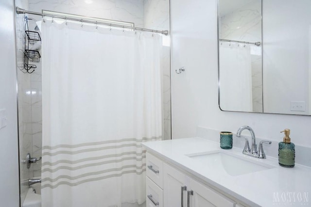 7310 S Brookwater Way, Stillwater, OK 74074 - full bathroom with vanity and shower / bath combo with shower curtain