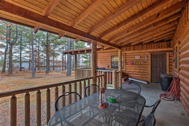 deck with outdoor dining space