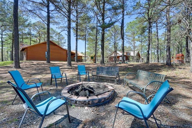 view of patio with an outdoor fire pit