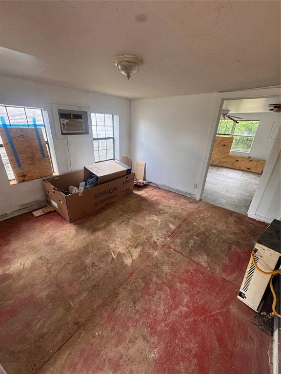 111 N 8th St, Seminole, OK 74868 - living area with a wall unit AC
