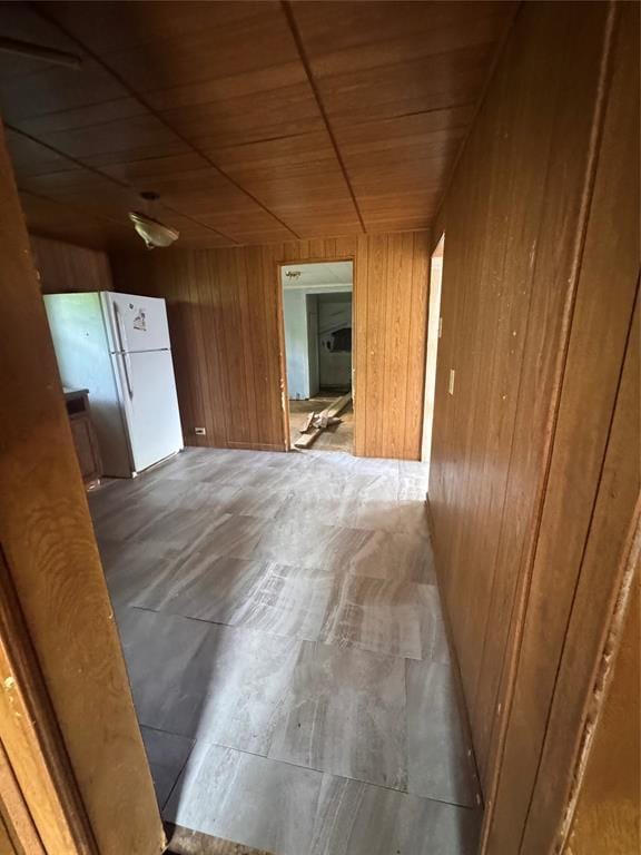 111 N 8th St, Seminole, OK 74868 - corridor featuring wooden walls