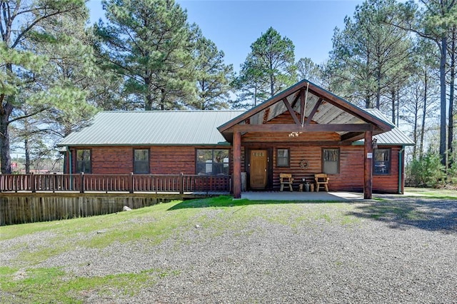 rustic home with metal roof