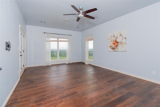 13403 NE 225th St, Fletcher, OK 73541 - unfurnished room featuring dark wood-style floors, ceiling fan, and baseboards