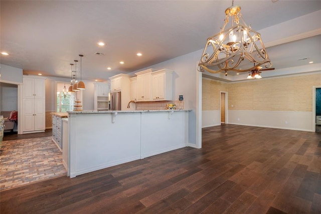 13403 NE 225th St, Fletcher, OK 73541 - kitchen featuring a chandelier, freestanding refrigerator, open floor plan, dark wood-style flooring, and recessed lighting