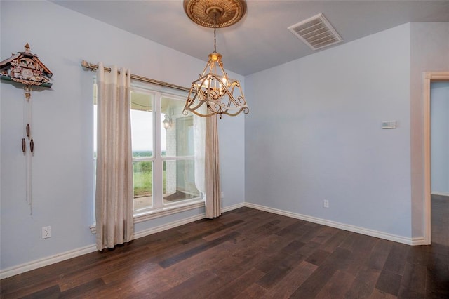 13403 NE 225th St, Fletcher, OK 73541 - spare room featuring dark wood-style floors, a chandelier, and baseboards