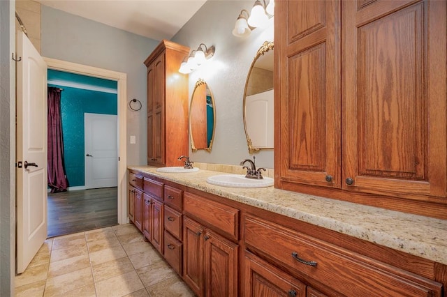 13403 NE 225th St, Fletcher, OK 73541 - bathroom featuring double vanity and tile patterned flooring