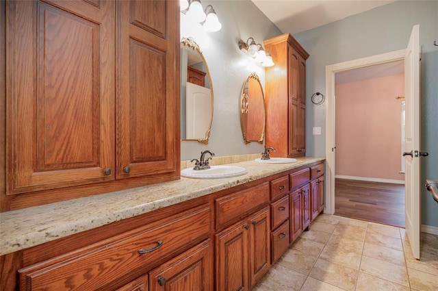 13403 NE 225th St, Fletcher, OK 73541 - bathroom featuring double vanity and baseboards