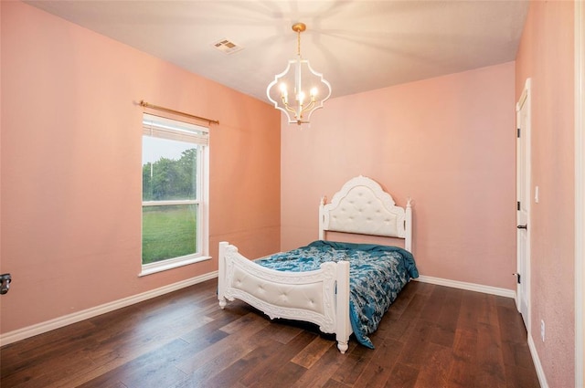 13403 NE 225th St, Fletcher, OK 73541 - bedroom featuring a chandelier, wood finished floors, and baseboards