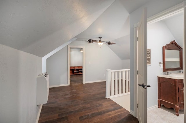 13403 NE 225th St, Fletcher, OK 73541 - bonus room featuring wood finished floors, vaulted ceiling, a sink, baseboards, and ceiling fan
