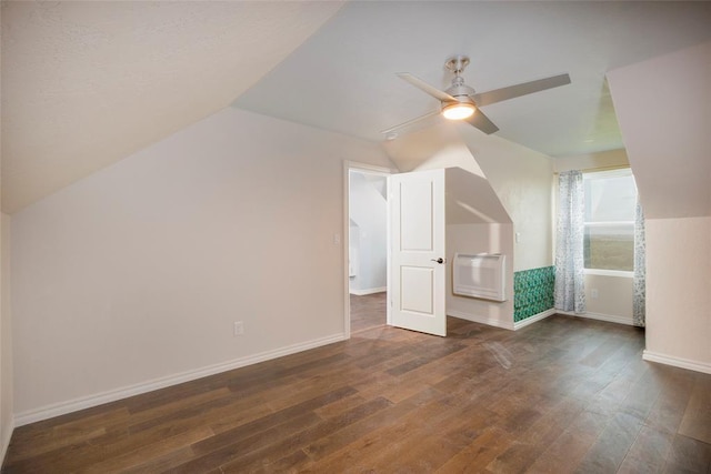 13403 NE 225th St, Fletcher, OK 73541 - additional living space featuring vaulted ceiling, wood finished floors, ceiling fan, baseboards, and heating unit