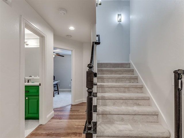 8509 NW 125th St, Oklahoma City, OK 73142 - stairway with wood finished floors, baseboards, and recessed lighting