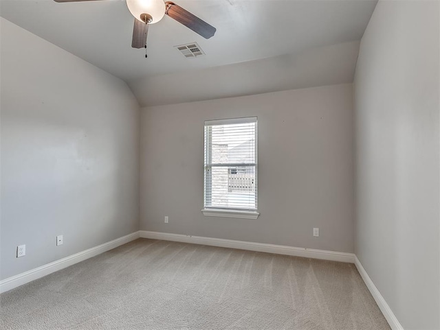 8509 NW 125th St, Oklahoma City, OK 73142 - unfurnished room with lofted ceiling, baseboards, light carpet, and a ceiling fan