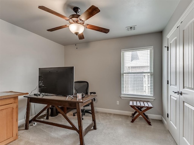 8509 NW 125th St, Oklahoma City, OK 73142 - home office featuring ceiling fan, baseboards, and light carpet