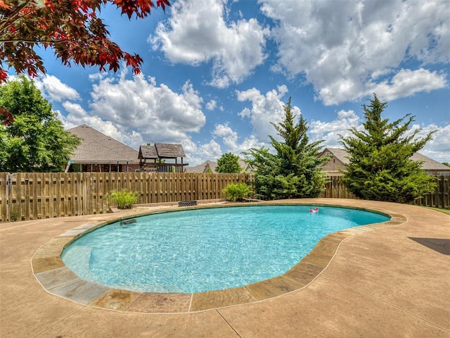 8509 NW 125th St, Oklahoma City, OK 73142 - view of swimming pool featuring a fenced backyard