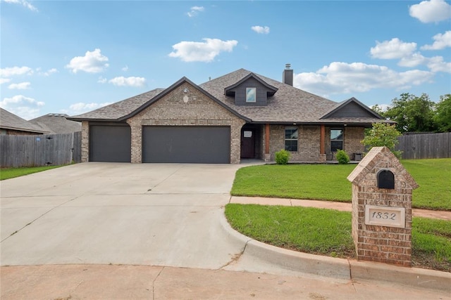 view of front of property with a garage, concrete driveway, a chimney, a shingled roof, and brick siding