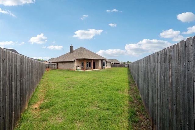 view of yard with a patio area
