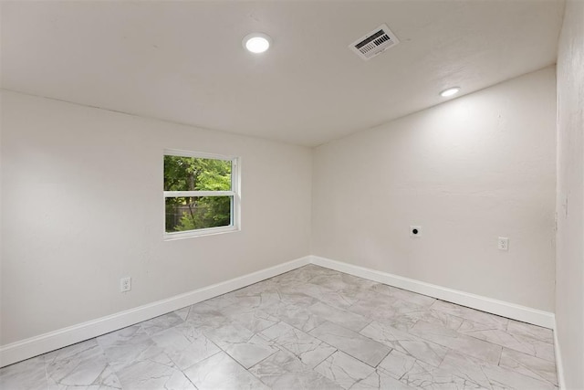 1225 NW 99th St, Oklahoma City, OK 73114 - empty room with light marble finish flooring, baseboards, and recessed lighting