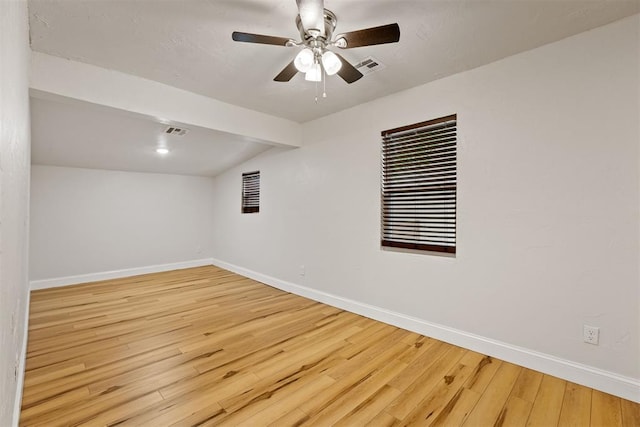 1225 NW 99th St, Oklahoma City, OK 73114 - spare room with baseboards, wood-type flooring, and a ceiling fan