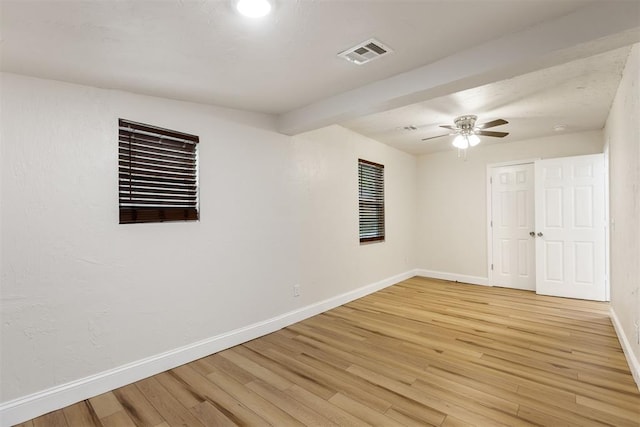 1225 NW 99th St, Oklahoma City, OK 73114 - unfurnished room with baseboards, light wood-style flooring, and ceiling fan