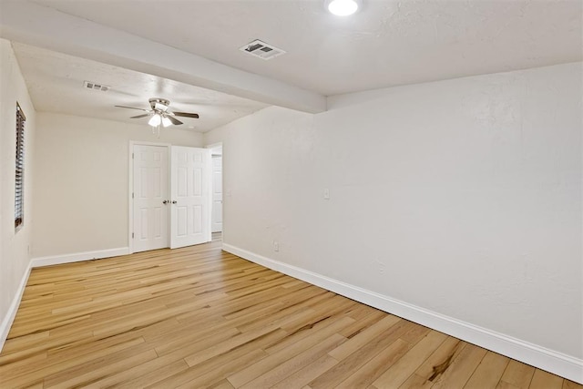 1225 NW 99th St, Oklahoma City, OK 73114 - spare room featuring wood finished floors, a ceiling fan, and baseboards