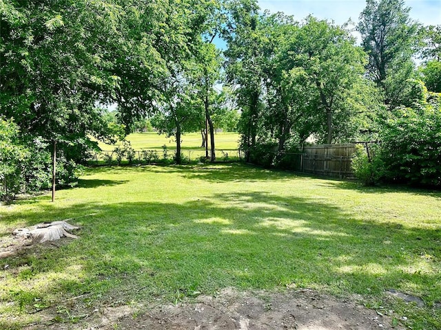 1225 NW 99th St, Oklahoma City, OK 73114 - view of yard featuring view of scattered trees