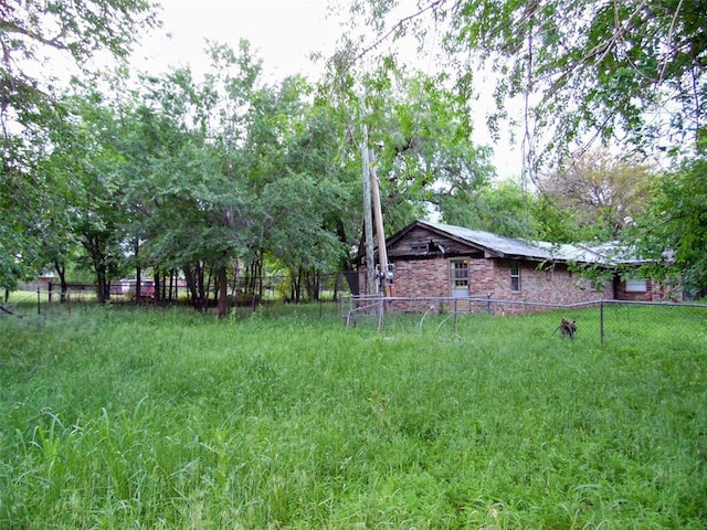 view of yard featuring fence