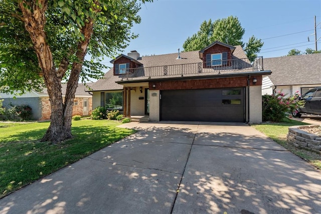 2220 NW 47th St, Oklahoma City, OK 73112 - traditional home with a balcony, a front yard, and brick siding