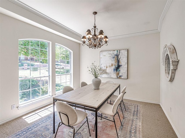 2417 Pawnee Xing, Edmond, OK 73034 - dining room with a chandelier, carpet, ornamental molding, and baseboards