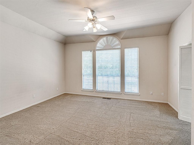 2417 Pawnee Xing, Edmond, OK 73034 - carpeted spare room featuring a ceiling fan and baseboards