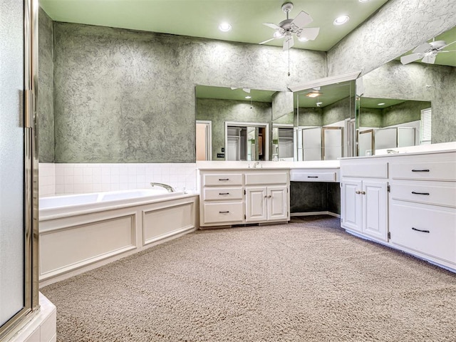 2417 Pawnee Xing, Edmond, OK 73034 - full bath featuring ceiling fan, a stall shower, vanity, and carpet flooring