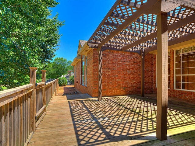 2417 Pawnee Xing, Edmond, OK 73034 - wooden terrace featuring a pergola and a patio area