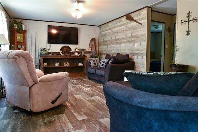 300746 Mcaly Rd, Foster, OK 73434 - living area with crown molding, wood finished floors, and wood walls