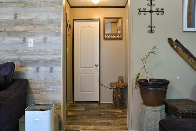300746 Mcaly Rd, Foster, OK 73434 - corridor with dark wood-type flooring and wood walls
