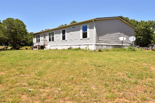 300746 Mcaly Rd, Foster, OK 73434 - back of property with a lawn and entry steps