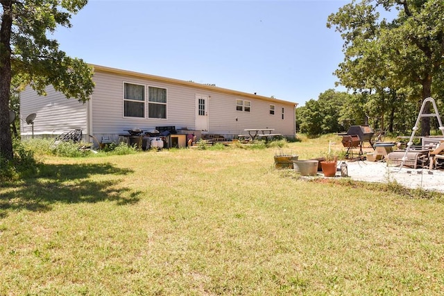 300746 Mcaly Rd, Foster, OK 73434 - view of grassy yard featuring a patio area