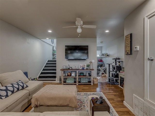 1072 County St Unit 2958, Tuttle, OK 73089 - living area with stairway, a ceiling fan, wood finished floors, and recessed lighting