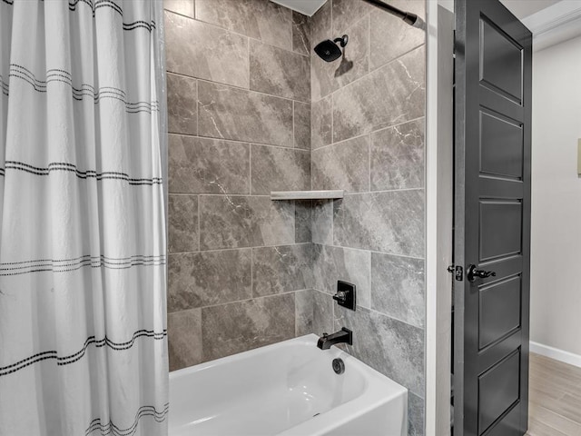 8332 Poplar Dr, Edmond, OK 73034 - bathroom featuring shower / bath combo and wood finished floors