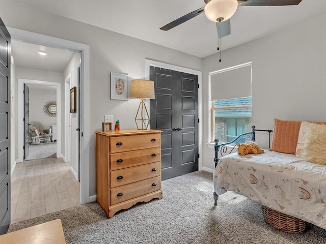 8332 Poplar Dr, Edmond, OK 73034 - bedroom featuring light carpet and a ceiling fan
