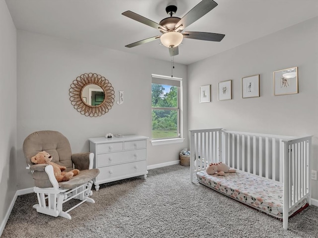 8332 Poplar Dr, Edmond, OK 73034 - bedroom featuring carpet, a crib, and ceiling fan