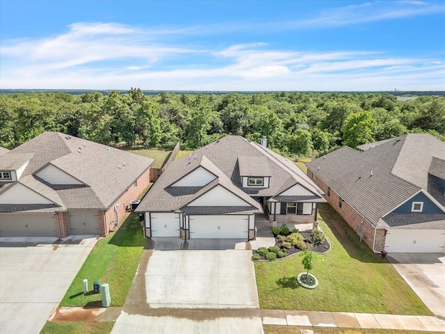 8332 Poplar Dr, Edmond, OK 73034 - view from above of property with a heavily wooded area