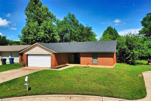 1208 Cathy Ln, Oklahoma City, OK 73110 - ranch-style house with an attached garage, a front lawn, driveway, and brick siding