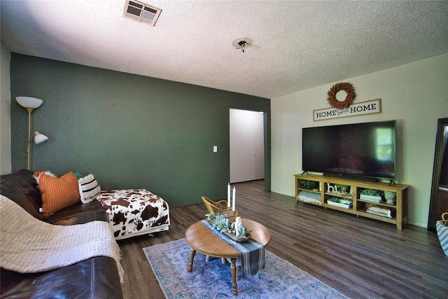 1208 Cathy Ln, Oklahoma City, OK 73110 - living room with a textured ceiling and wood finished floors