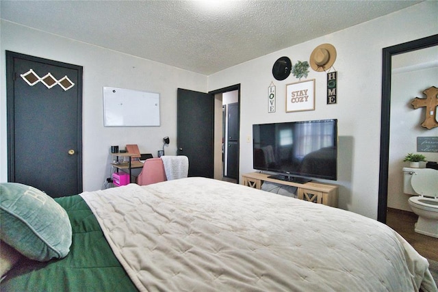 1208 Cathy Ln, Oklahoma City, OK 73110 - bedroom featuring a textured ceiling