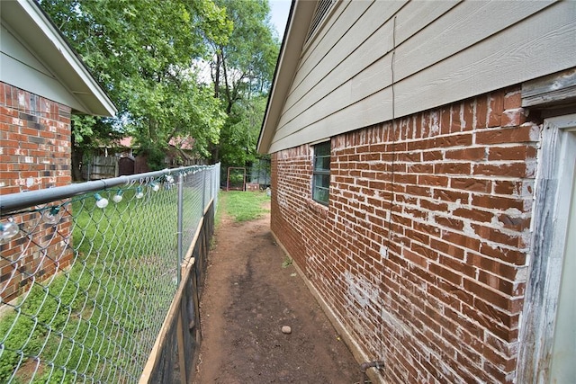 1208 Cathy Ln, Oklahoma City, OK 73110 - view of side of home with brick siding