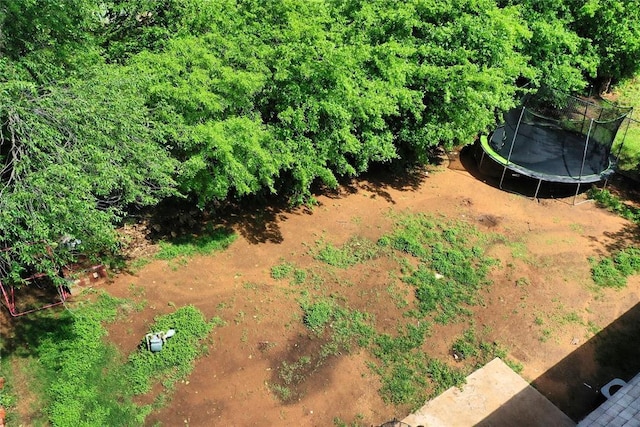 1208 Cathy Ln, Oklahoma City, OK 73110 - view of yard with a trampoline