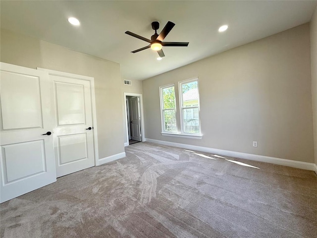 unfurnished bedroom with carpet floors, baseboards, recessed lighting, and ceiling fan