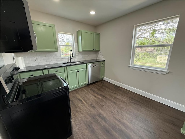 kitchen featuring green cabinets, black range with electric cooktop, a sink, dishwasher, and recessed lighting